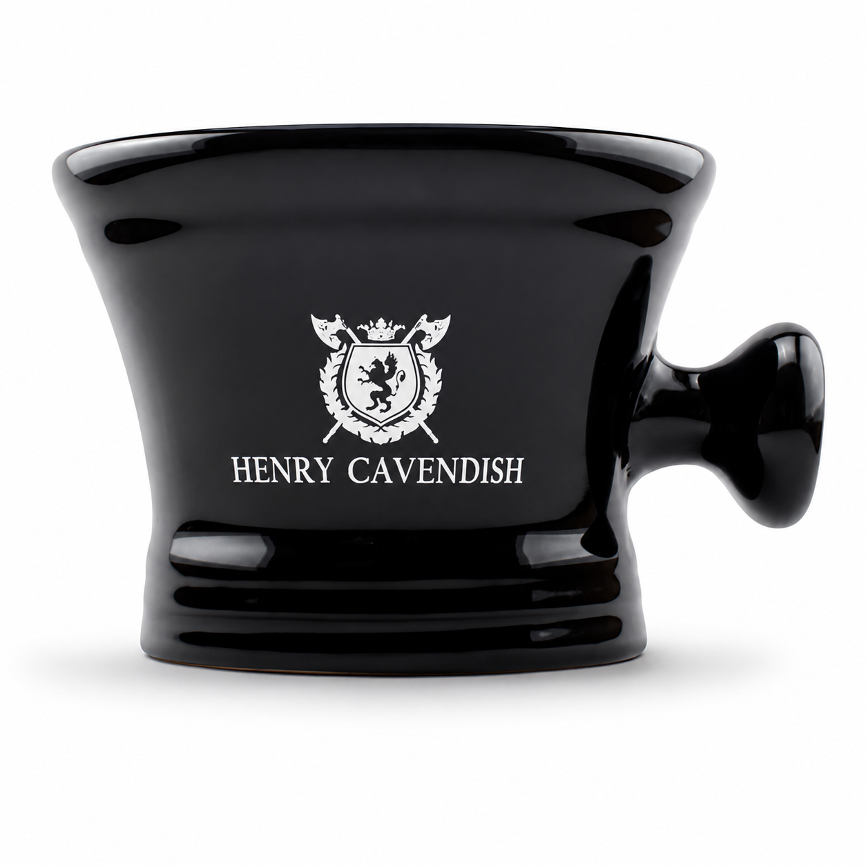 A glossy black ceramic shaving bowlset with a handle, featuring a white printed crest and the name 'HENRY CAVENDISH' on the front, set against a plain white background.